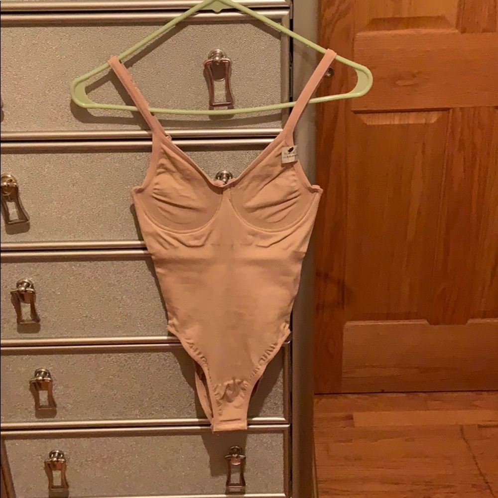 A Tummy Tuck Bodysuit-Shapewear